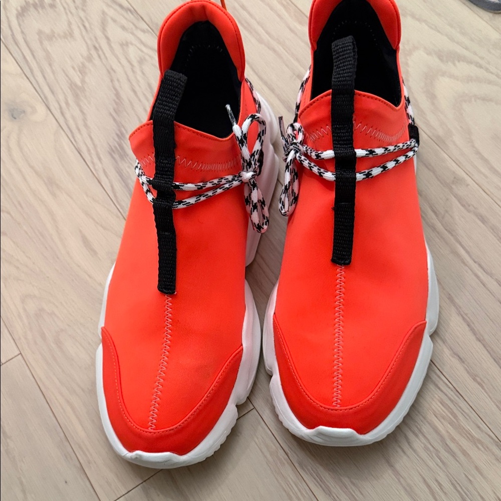 Vibrant Red Sneakers with Black Accents